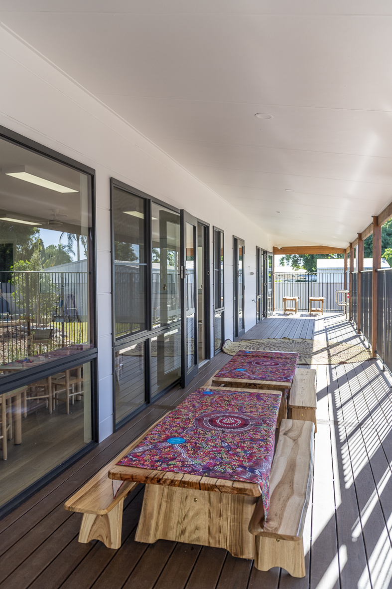 The covered verandah at First5Years Emerald, opening from the rooms to the yard.