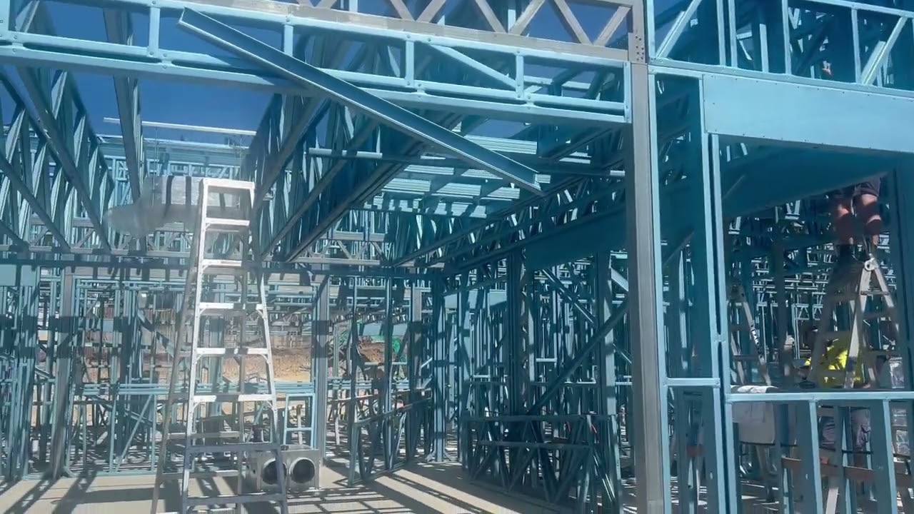 Steel framing and roof structure taking shape across the First5Years Gladstone site.